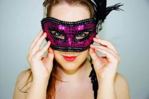 Canva-Woman-Wearing-Eye-Mask-for-Party-scaled